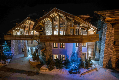 Chalet Face Val d'Isere - exterior of the chalet at night